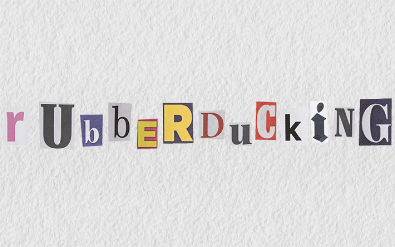 krantenuitknipsels van letters die het woord 'rubber ducking' vormen (© Edith Coen | dwars) 